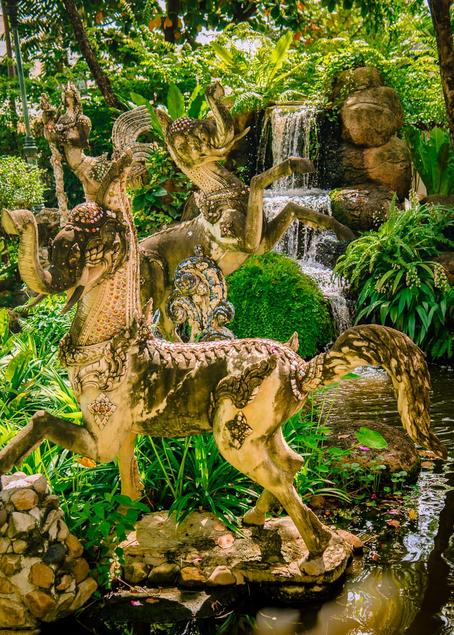 Demon statues in the gardens of the Erawan Museum in Bangkok, Thailand.