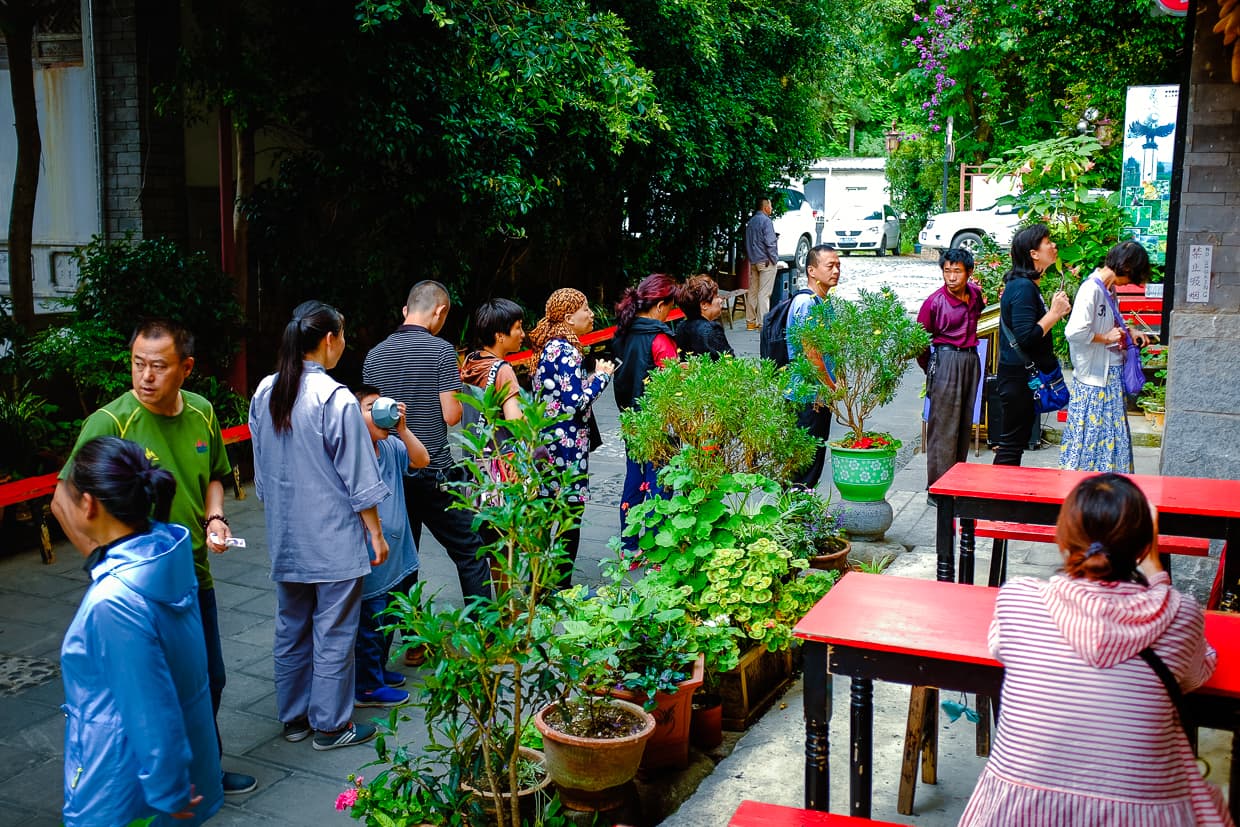 The line of people waiting to get into Yirantang vegetarian restaurant in Dali, China.