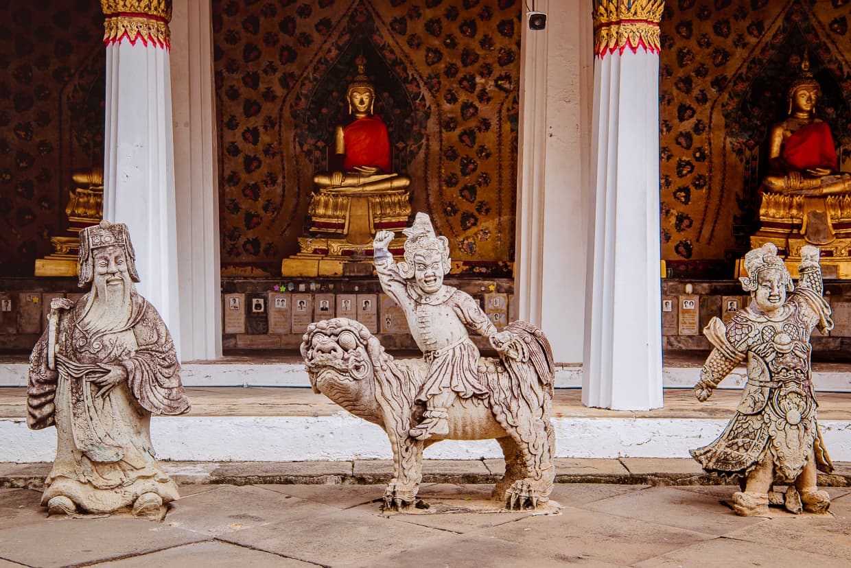 Statues in the courtyard of the Ordination Hall at Wat Arun.