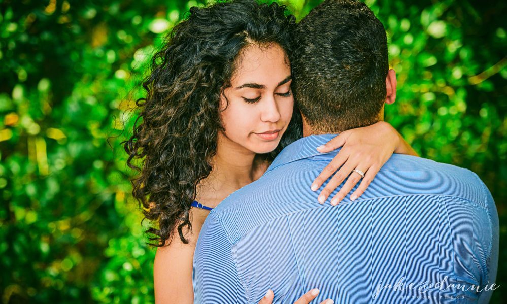 loving embrace between Amy and Luigi during Florida engagement session