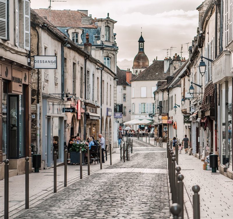 A beautiful cobblestone street in Beaune, France, our overnight stop on our roadtrip from Paris to Avignon.