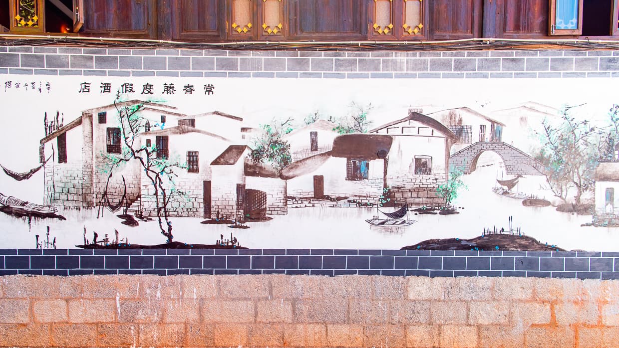 A Lijiang Old Town mural. Yunnan, China.