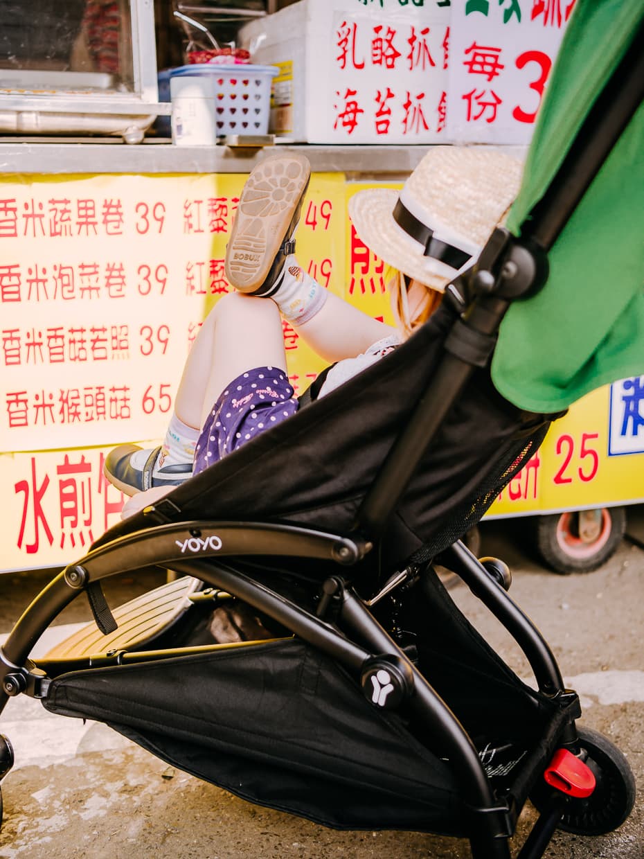 Testing the comfortability of the Babyzen Yoyo Travel Stroller.