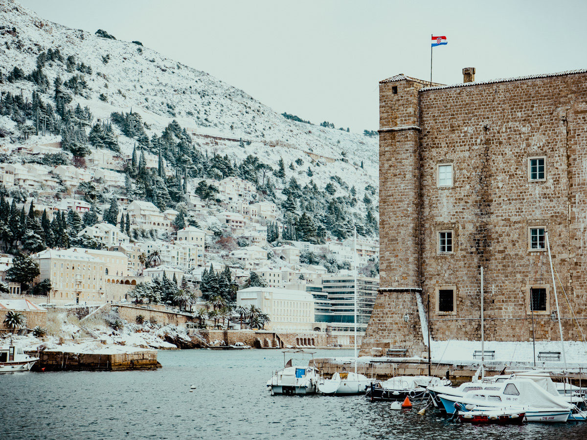 The dubrovnik harbor during a rare Croatian snow fall