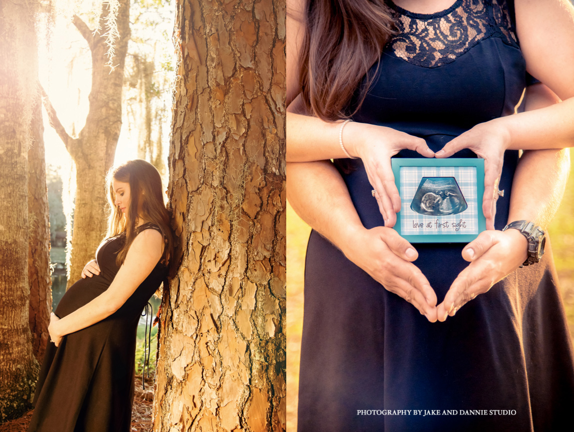 Couple makes a heart with their hands around the sonogram image of their future child