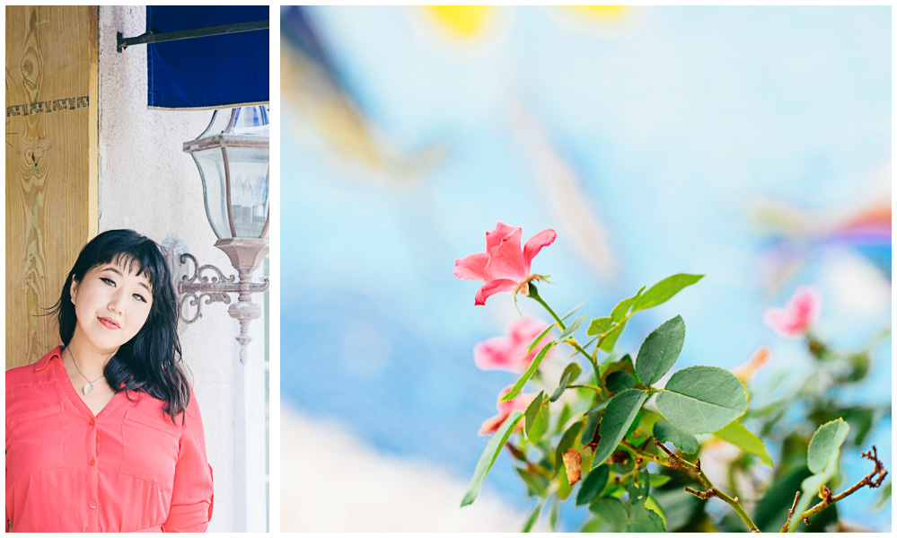 Dannie poses in a pink dress near a lantern on cedar key, and a flower grows near a mural on the wall