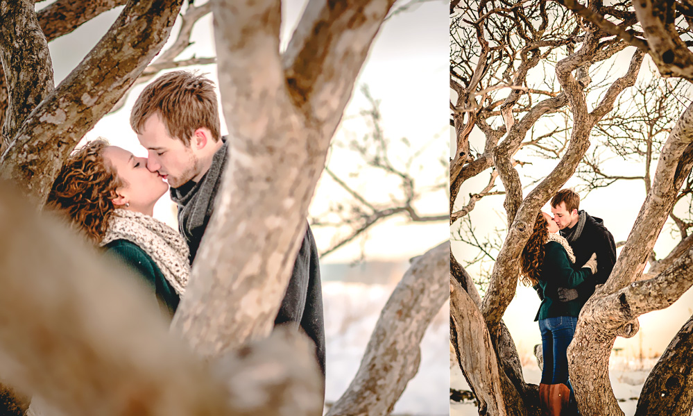 couple kisses in engagement photo
