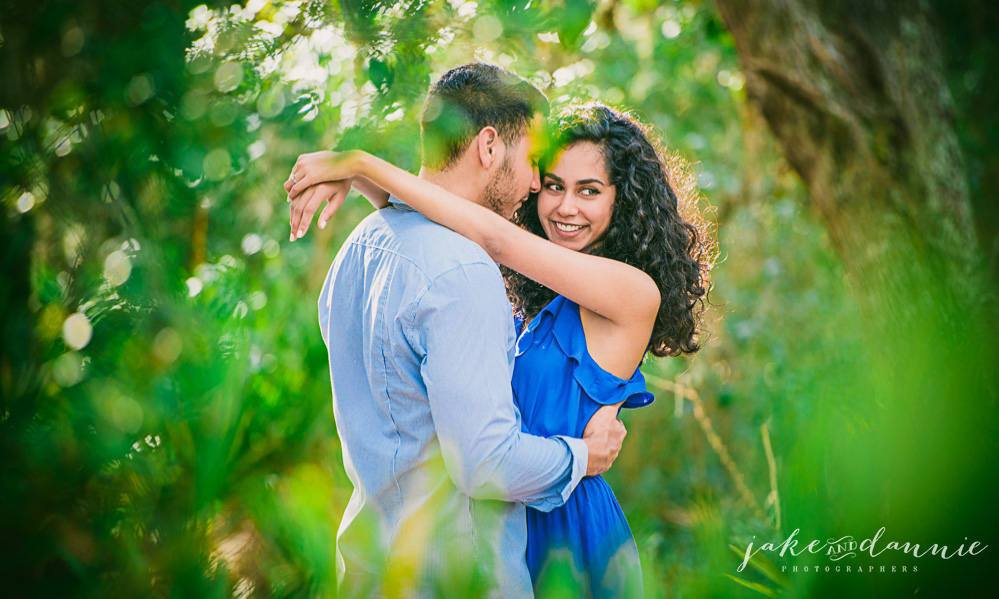 Embrace in the forest between loving couple