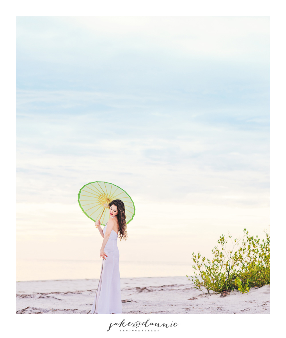 Model in beautiful white dress in Florida sunshine