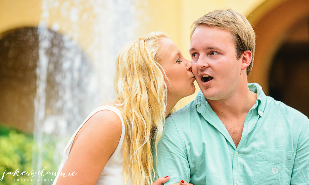 Jim gets a kiss on the cheek  during his couples photography session