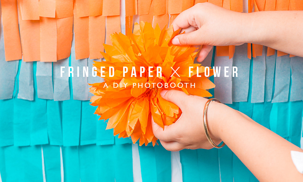 Fringed paper photo booth backdrop diy